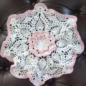 Elegant White and Pink Crochet Doily